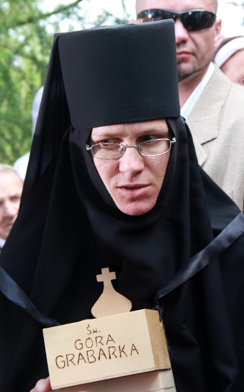 Collecting money in Grabarka Monastery