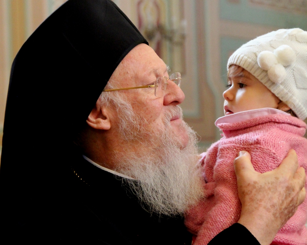 Patriarch Bartholomew with child