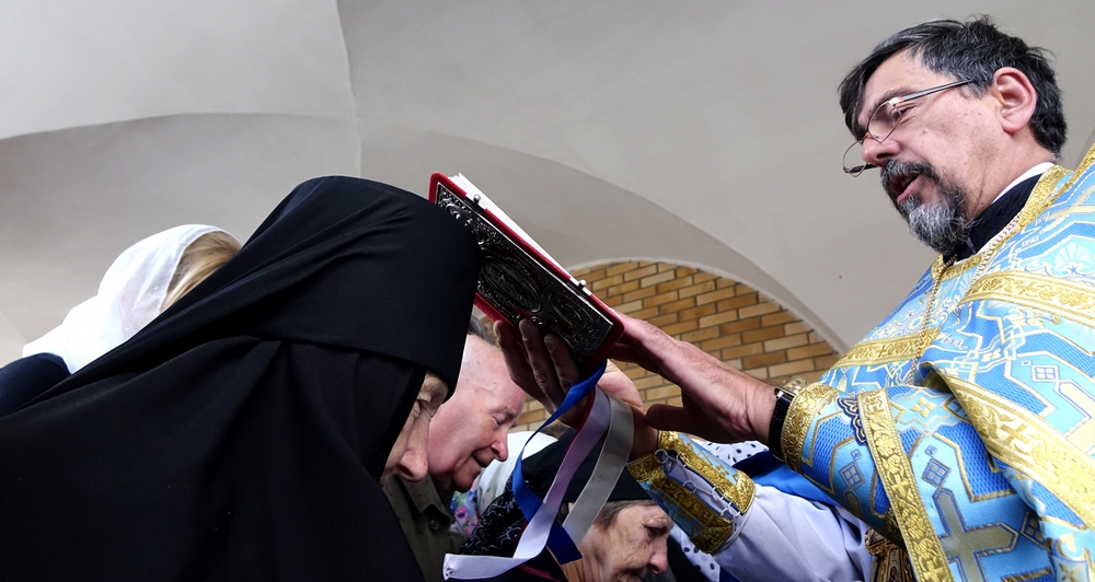 Gospel reading during procession in Zwierki Convent