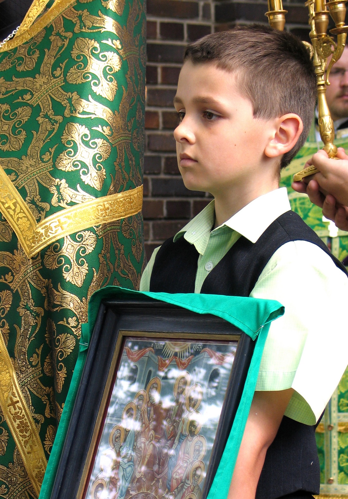 A bit old portraits... A boy with an icon, 2010