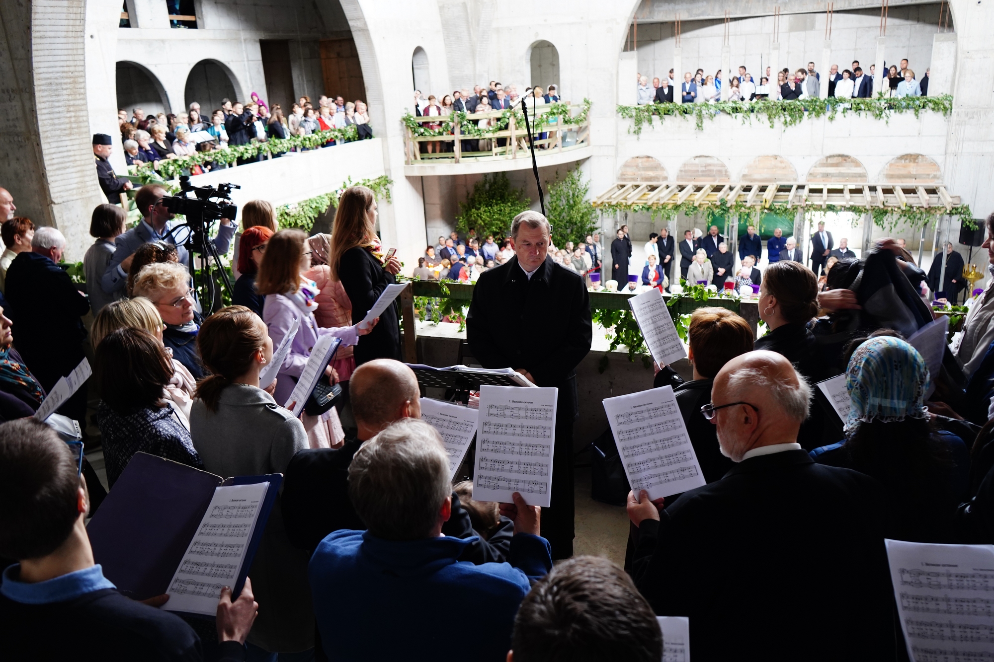 Blessing and elevation of main cross on the roof of Hagia Sophia Orthodox church in Warsaw