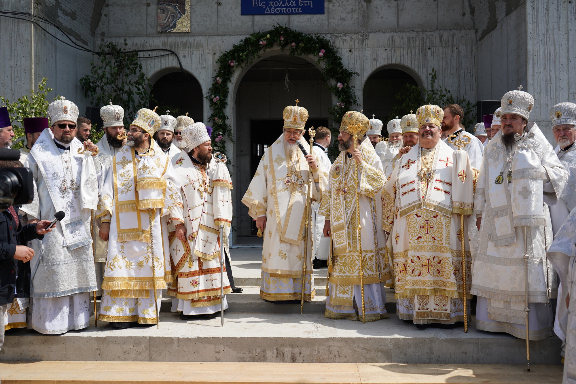 Blessing and elevation of main cross on the roof of Hagia Sophia Orthodox church in Warsaw