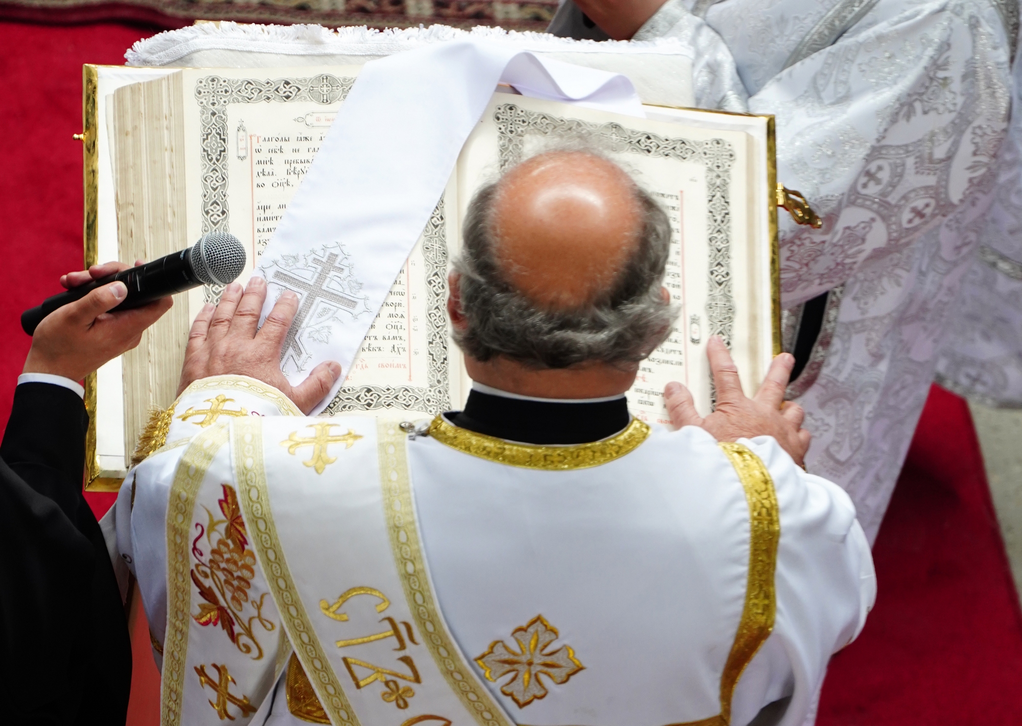 Blessing and elevation of main cross on the roof of Hagia Sophia Orthodox church in Warsaw