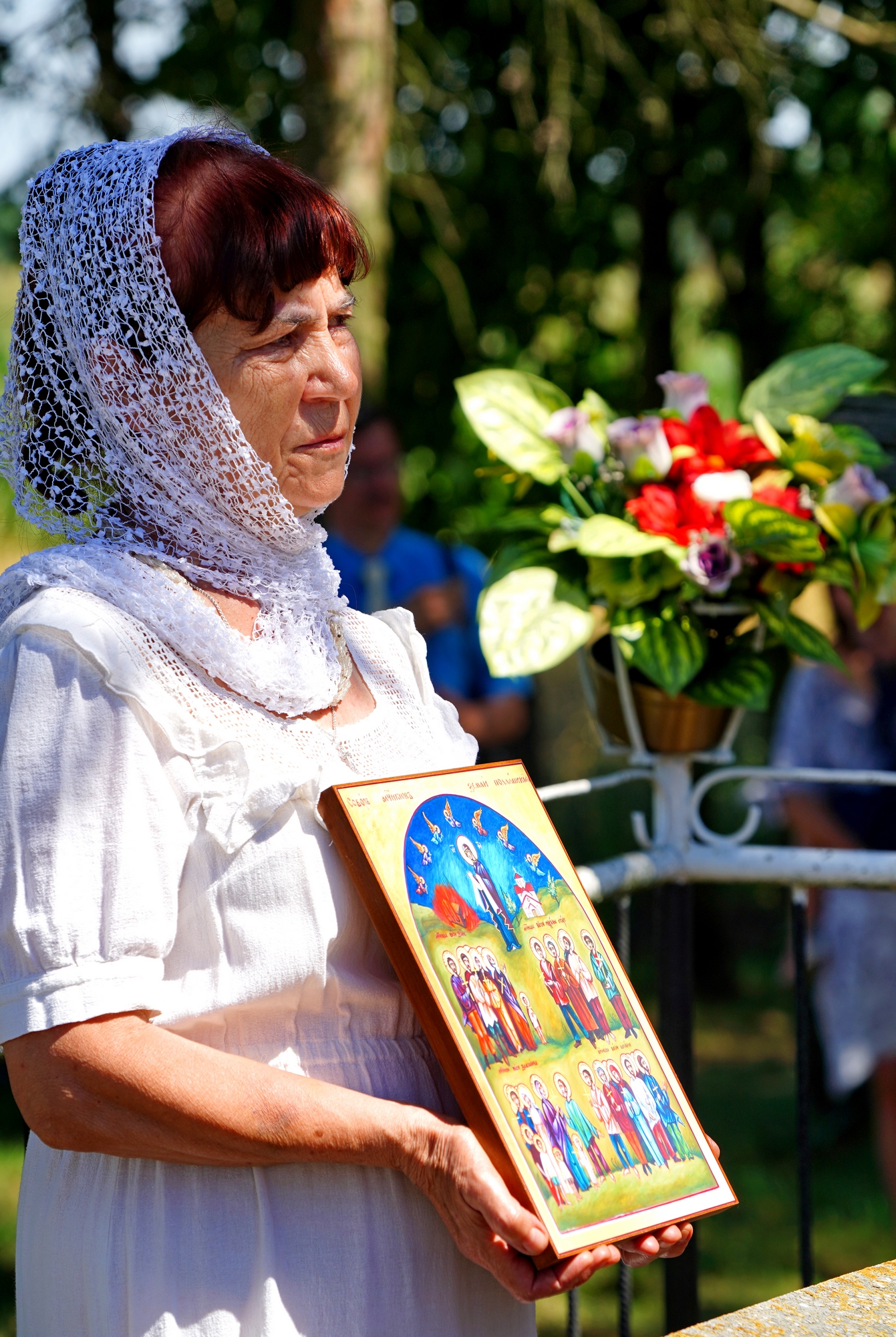 The prayer at Podlasie Martyrs grave close to Zanie village