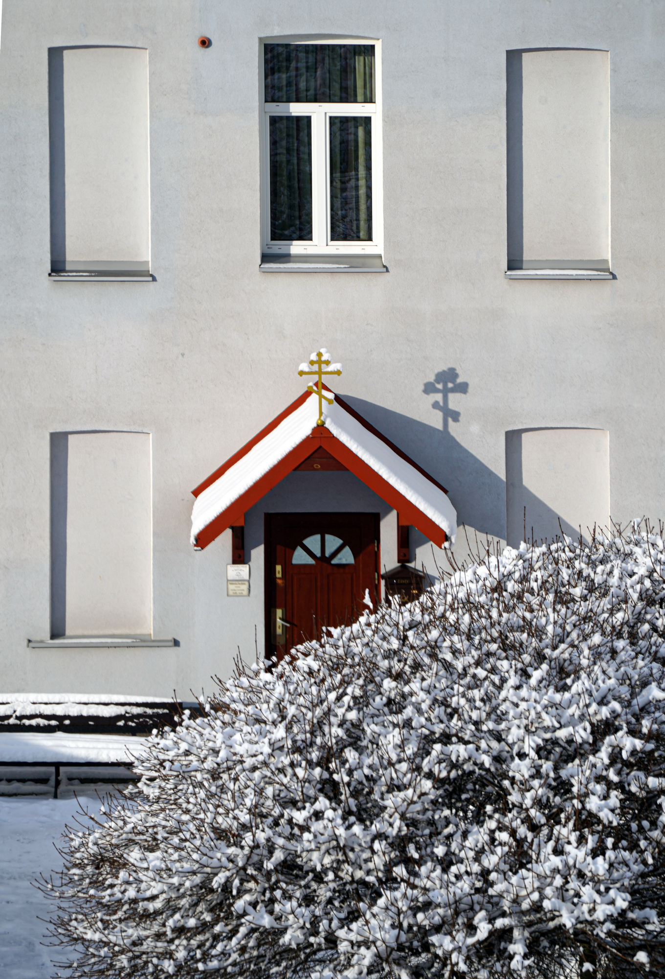 Twoo crosses on St. Nicholas parish house in Białystok