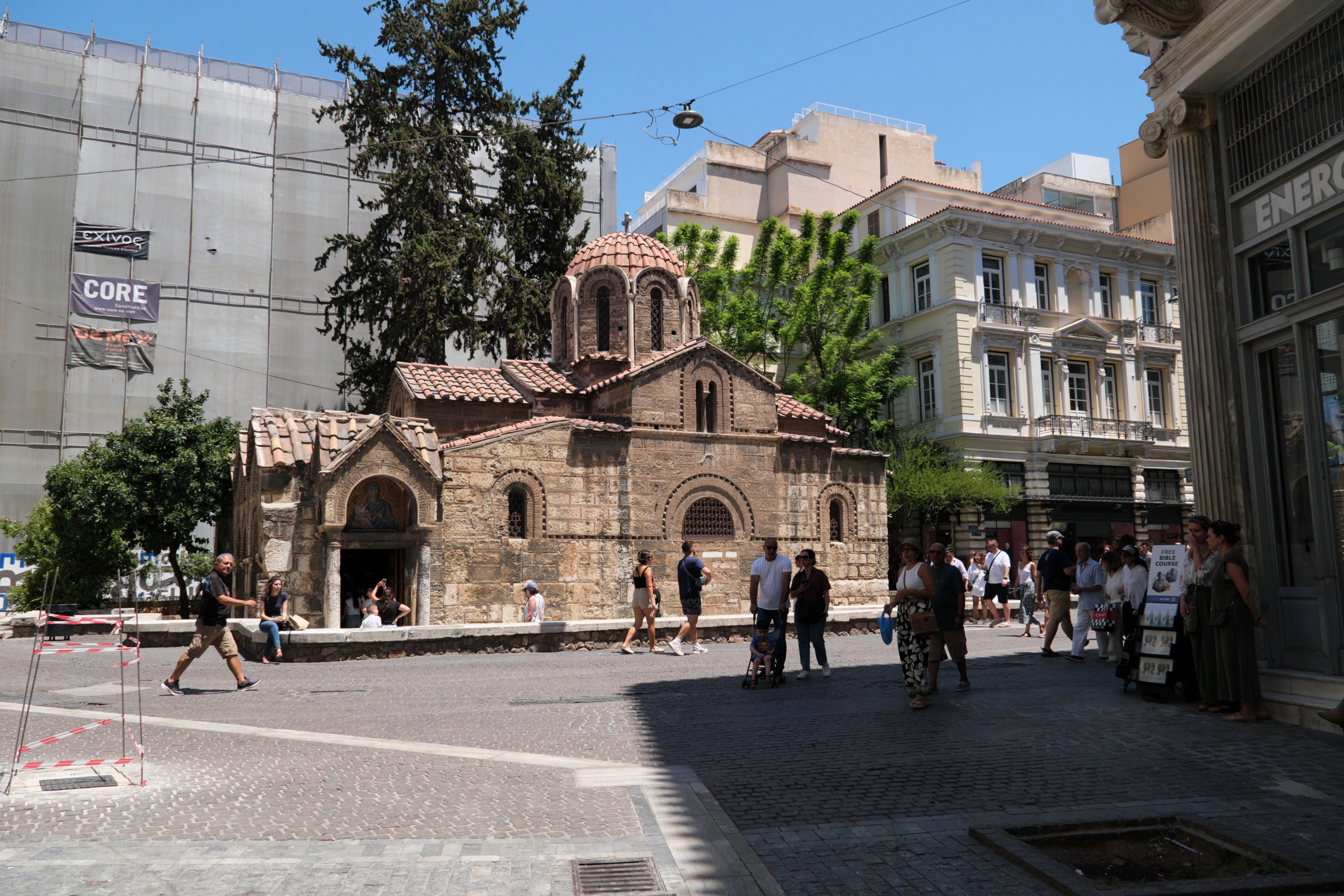 Orthodox church in light and Jehowa witness in the shadow - Athens