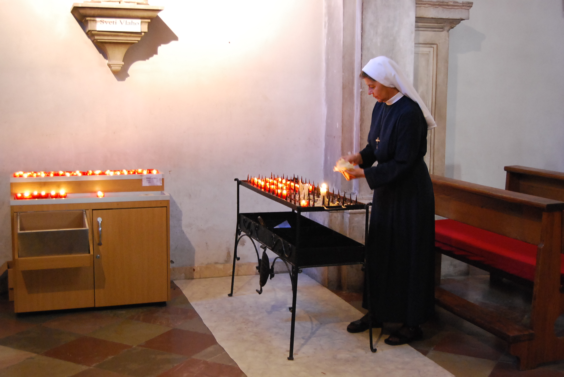 Nun with candles