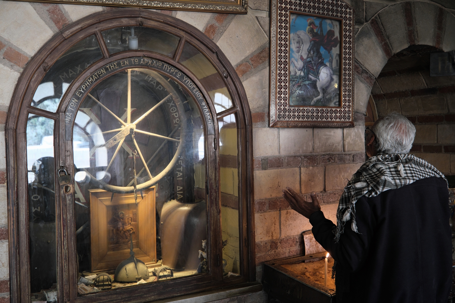 Believer praying in Greek Orthodox church of st. George in Cairo