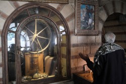 Sheep1389 
 Believer praying in Greek Orthodox church of st. George in Cairo