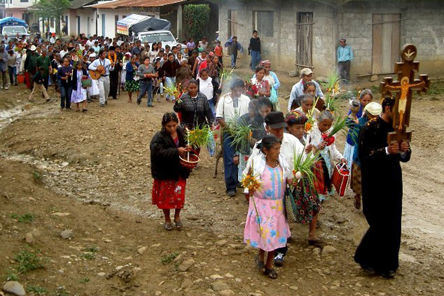 THE BISHOP ENTERS A MEXICAN ORTHODOX VILLAGE  